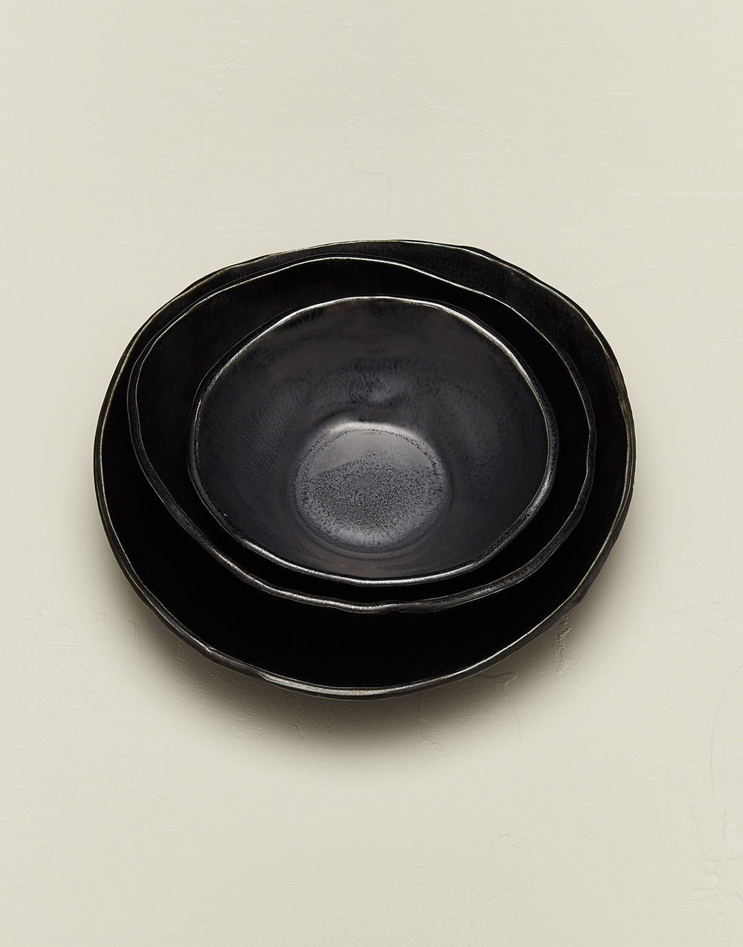 DBO HOME black ceramic bowl stack of small batch artisan porcelain pieces