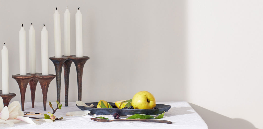 Christina Lane WIlliam Geddes Hot Chocolate Tastemakers Table with DBO HOME black ceramic serving dish with apples and bronze cast candlesticks 