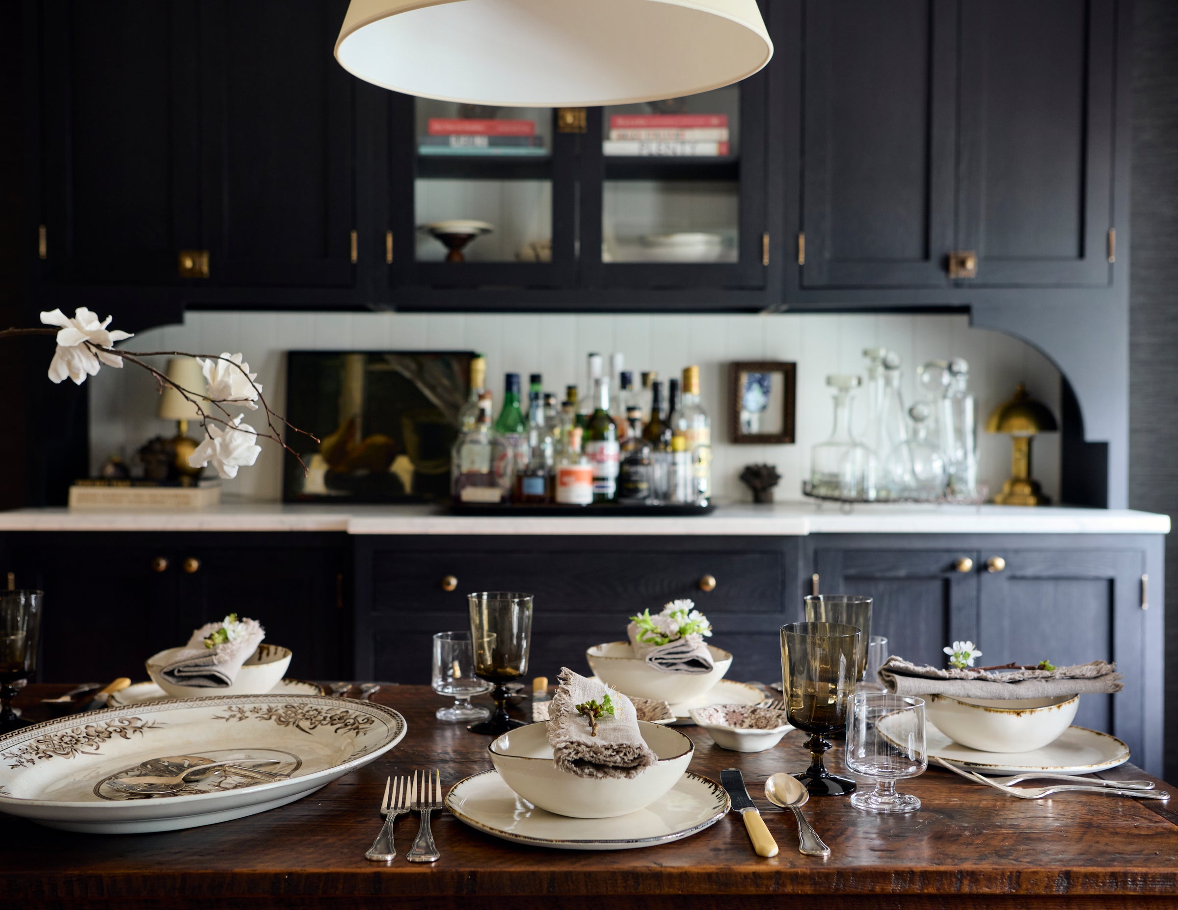 dining room with table set Bare dinnerware