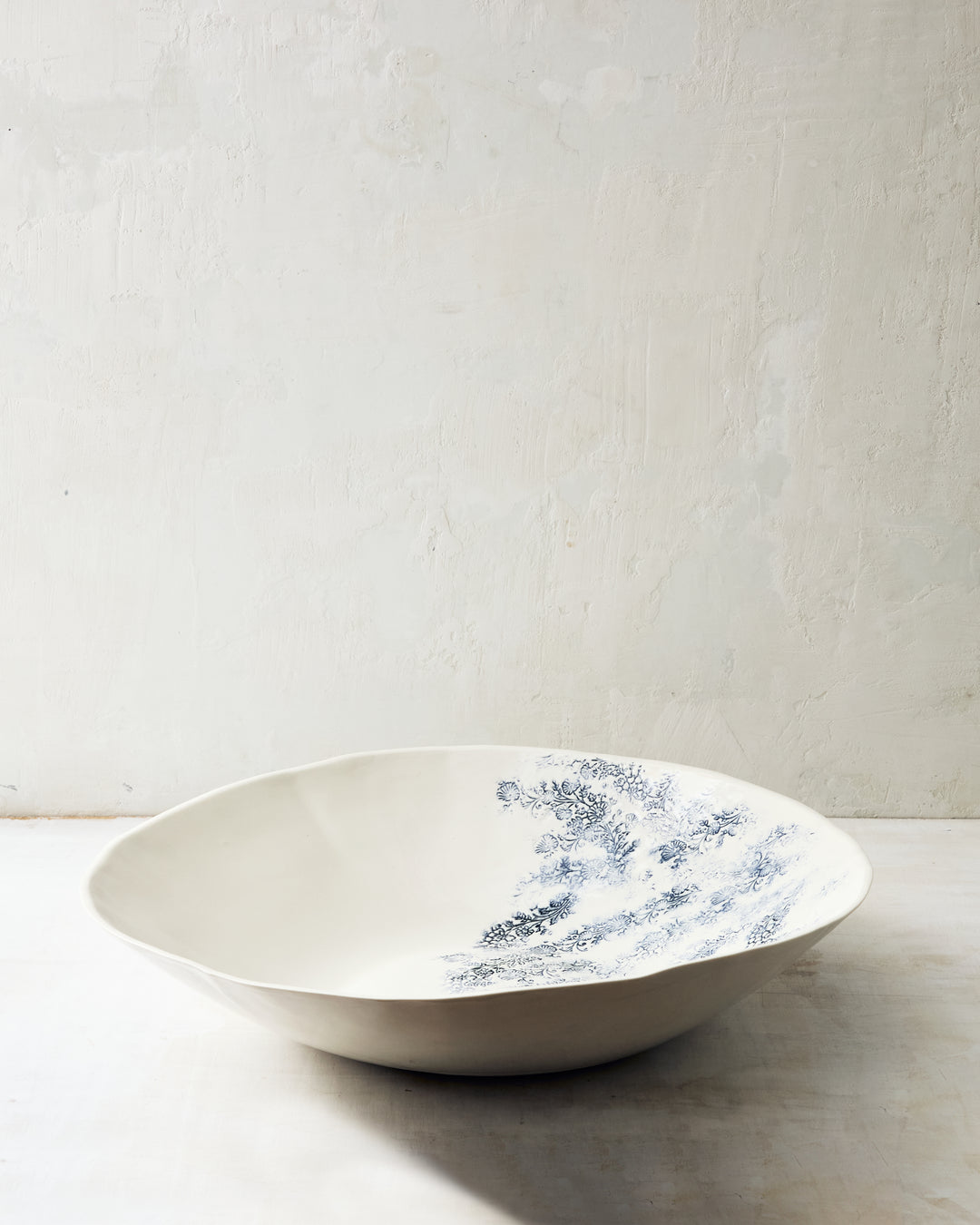 Handmade Kashmir XL bowl in white porcelain with blue floral pattern, generous scale for serving and sharing.