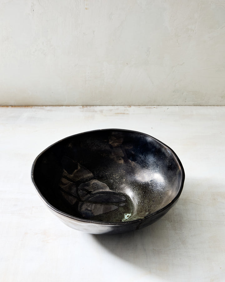 DBO HOME Wabi Ramen Bowl in Granite glaze, handmade porcelain with a wide deep form, layered mussel and snowflake glaze, and stone-like surface texture, photographed on a whitewashed surface.