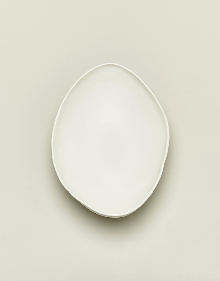 DBO HOME handmade ceramic oval serving bowl in creamy off-white