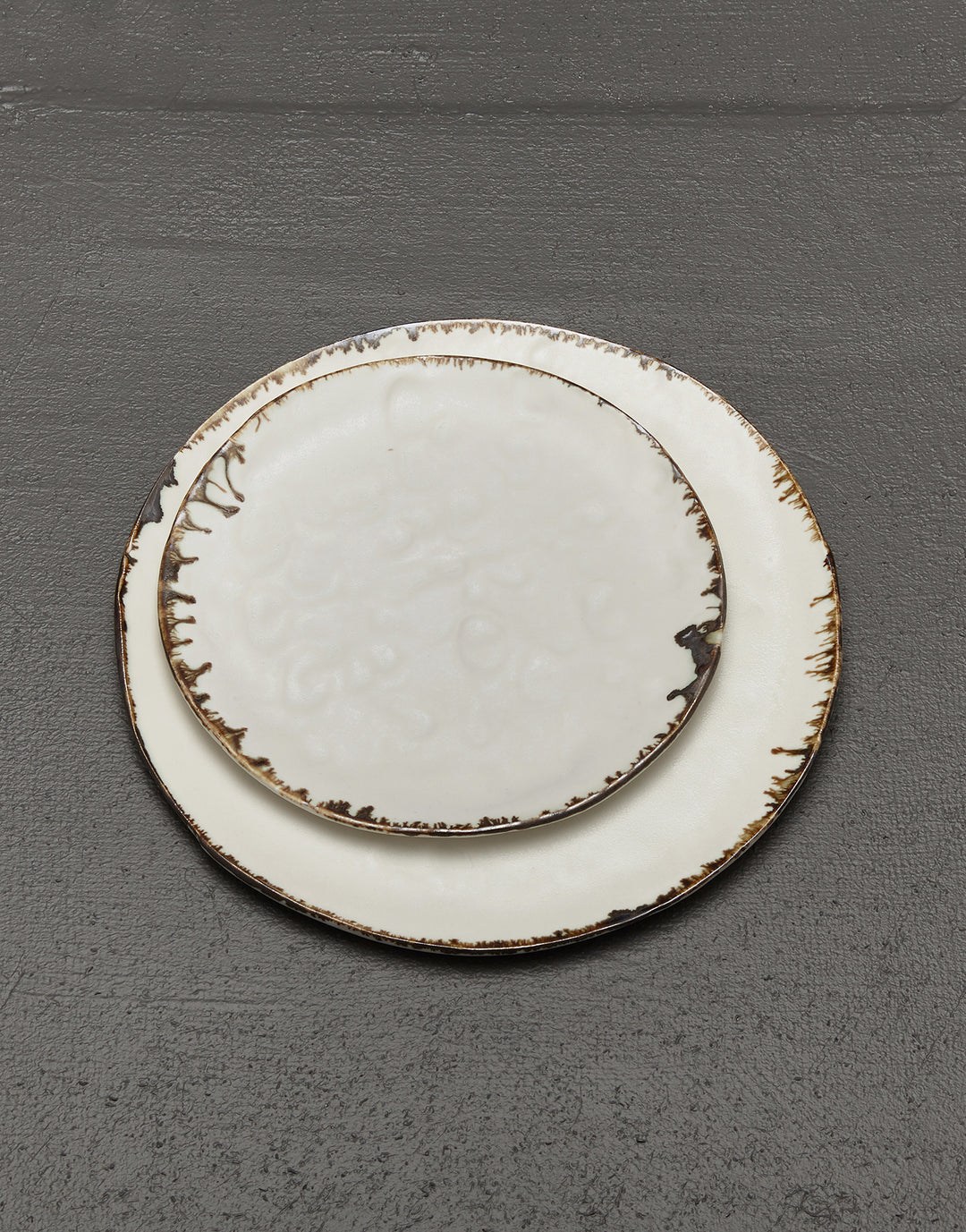 artisan ceramic luxury dinner plate and salad plate, textured white porcelain with decorative bronze drip edges